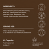 A brown informational panel with text listing ingredients, serving size, and capsule count, alongside circular icons indicating vegan, gluten free, soy free, and dairy free.