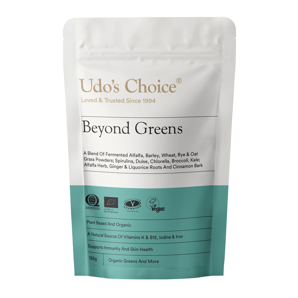 Udo's Choice Beyond Greens supergreens powder with fermented grasses, organic greens, and gut health herbs in a resealable pouch