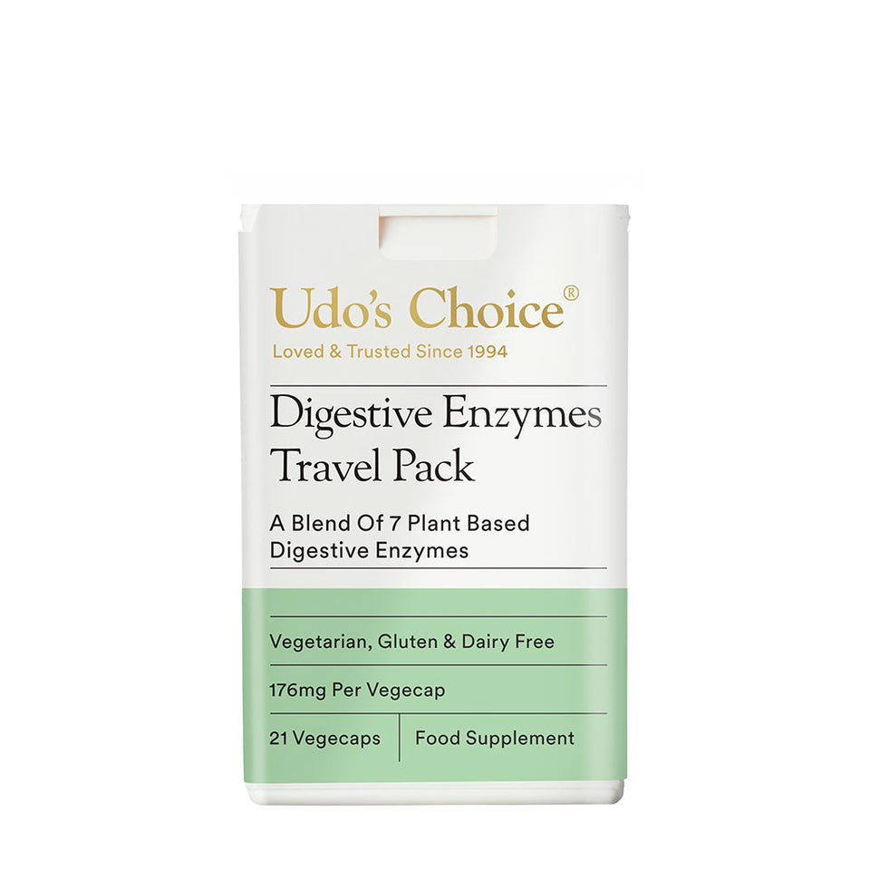 Packaging of Udo's Choice Digestive Enzymes Travel Pack, displaying the brand name, product name, and dietary preferences such as vegetarian and dairy-free, along with the number of vegecaps and the statement 'Food Supplement'.