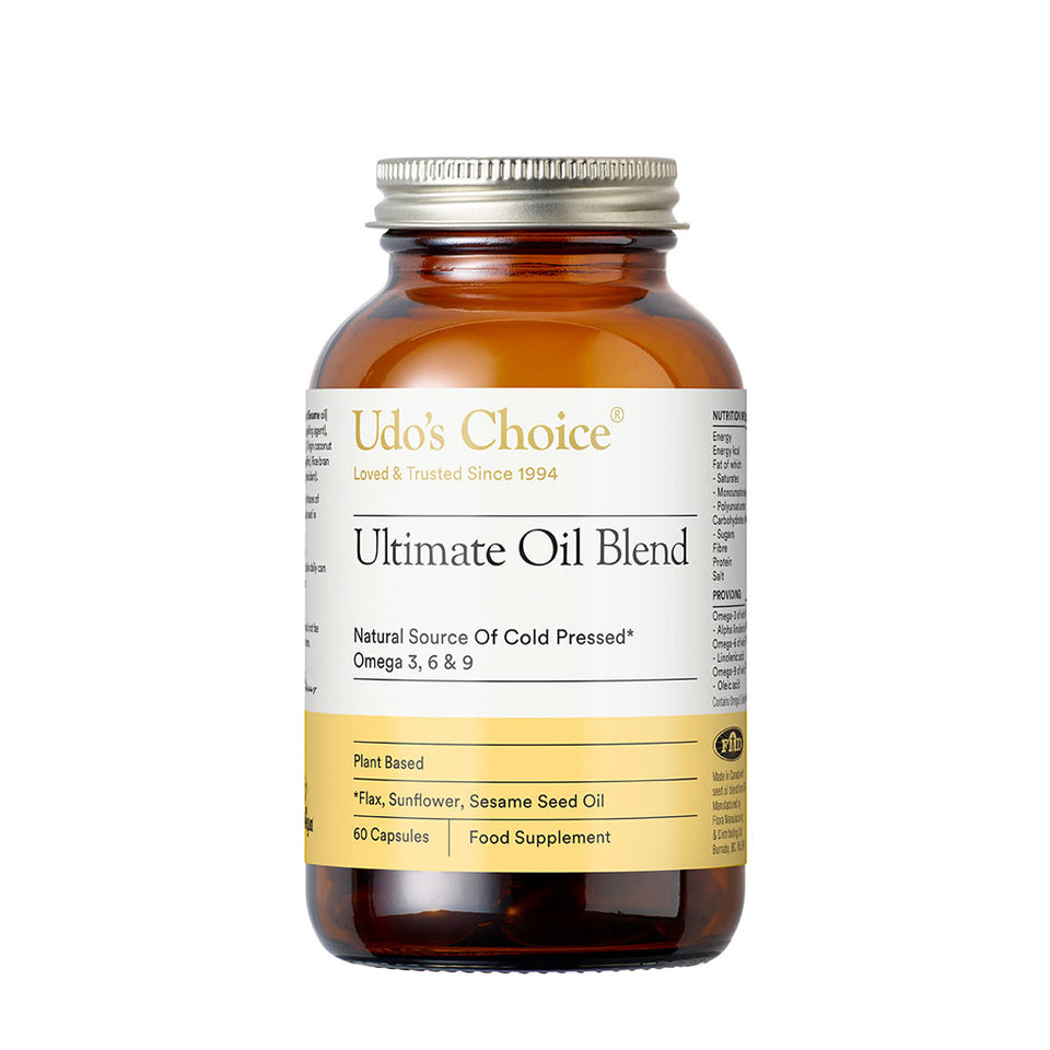 A bottle of Udo's Choice Ultimate Oil Blend capsules, which are a dietary supplement providing essential fatty acids.