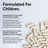Probiotic capsules with text about children's health and probiotics on a light background